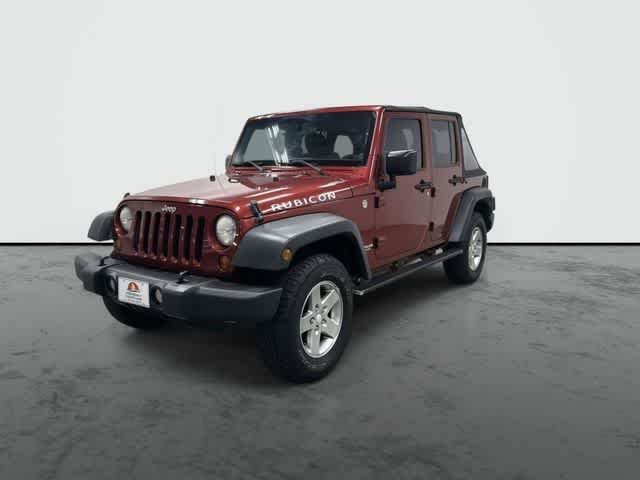2011 Jeep Wrangler Unlimited Rubicon Deep Cherry Red Crystal Pearl Coat at Group 1 Toyota Southwest