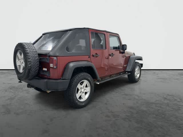 2011 Jeep Wrangler Unlimited Rubicon Deep Cherry Red Crystal Pearl Coat at Group 1 Toyota Southwest
