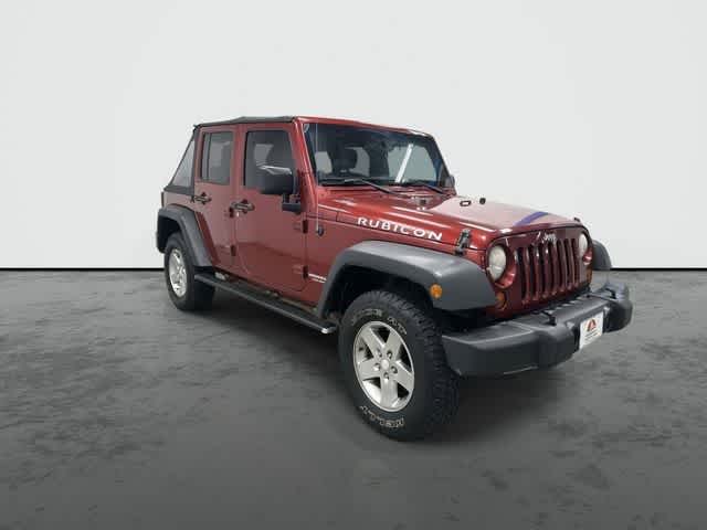 2011 Jeep Wrangler Unlimited Rubicon Deep Cherry Red Crystal Pearl Coat at Group 1 Toyota Southwest