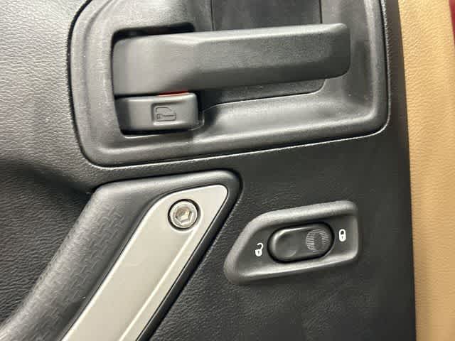 2011 Jeep Wrangler Unlimited Rubicon Deep Cherry Red Crystal Pearl Coat at Group 1 Toyota Southwest