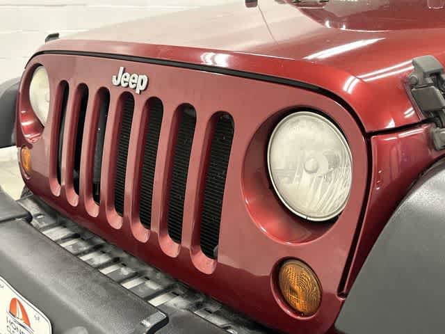 2011 Jeep Wrangler Unlimited Rubicon Deep Cherry Red Crystal Pearl Coat at Group 1 Toyota Southwest