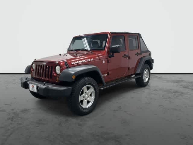 2011 Jeep Wrangler Unlimited Rubicon Deep Cherry Red Crystal Pearl Coat at Group 1 Toyota Southwest