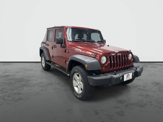 2011 Jeep Wrangler Unlimited Rubicon Deep Cherry Red Crystal Pearl Coat at Group 1 Toyota Southwest
