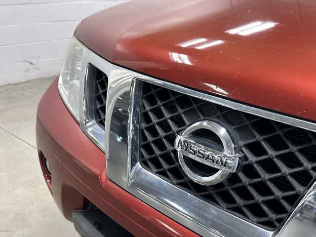 2013 Nissan Frontier SV Cayenne Red at Mac Haik CDJR North Houston