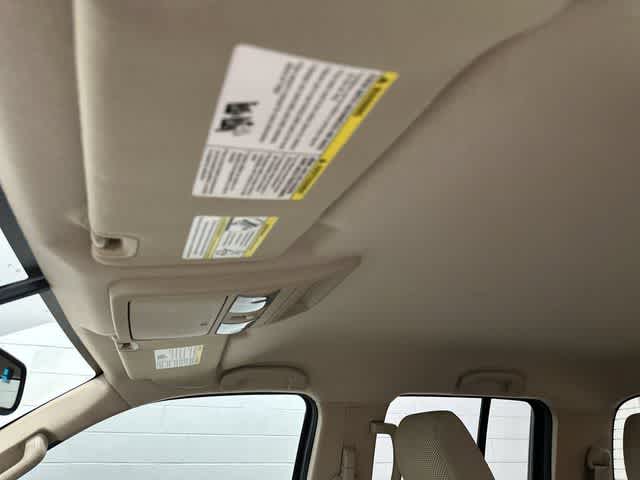 2013 Nissan Frontier SV Cayenne Red at Mac Haik CDJR North Houston