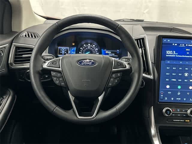 2024 Ford Edge Titanium Rapid Red Metallic Tinted Clearcoat at AutoNation USA Katy