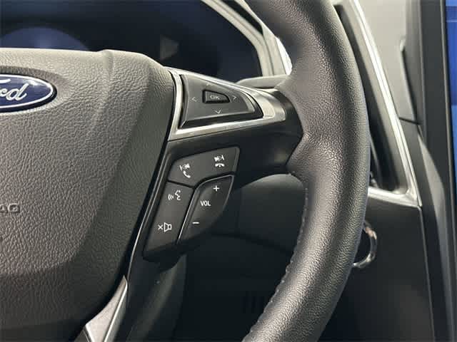 2024 Ford Edge Titanium Rapid Red Metallic Tinted Clearcoat at AutoNation USA Katy