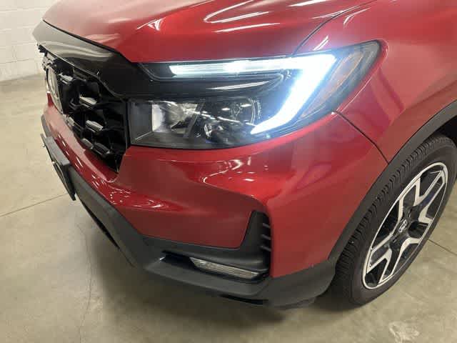 2023 Honda Passport Elite Radiant Red Metallic II at Beck & Masten Kia