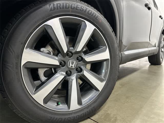 2025 Honda Pilot Touring Crystal Black Pearl at Honda of Clear Lake