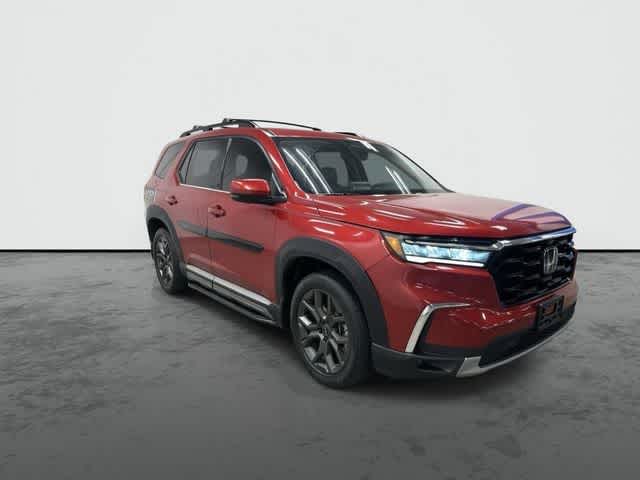 2023 Honda Pilot Elite Radiant Red Metallic II at Beck & Masten Kia