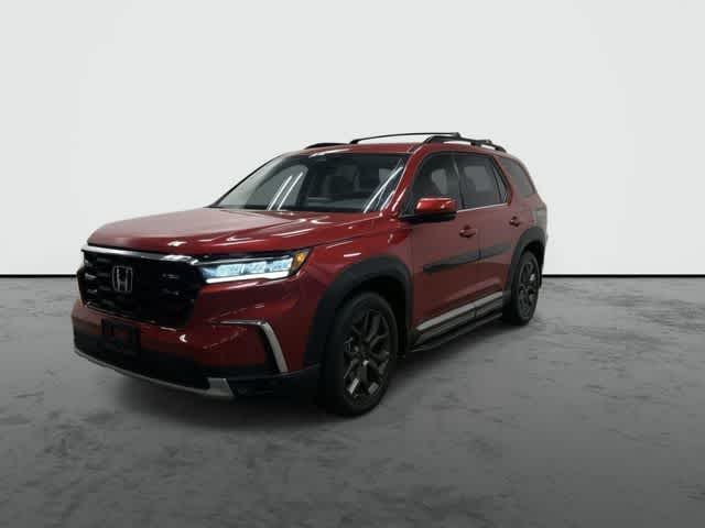 2023 Honda Pilot Elite Radiant Red Metallic II at Beck & Masten Kia