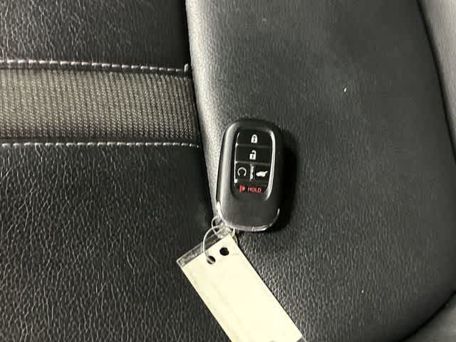 2024 Honda Pilot EX-L 8 Passenger Crystal Black Pearl at Tomball Ford