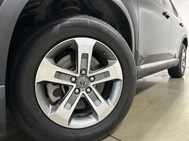 2024 Honda Pilot EX-L 8 Passenger Crystal Black Pearl at Tomball Ford