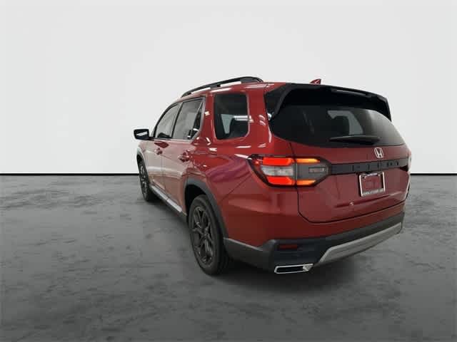 2025 Honda Pilot Touring+ Radiant Red Metallic II at Honda of Clear Lake