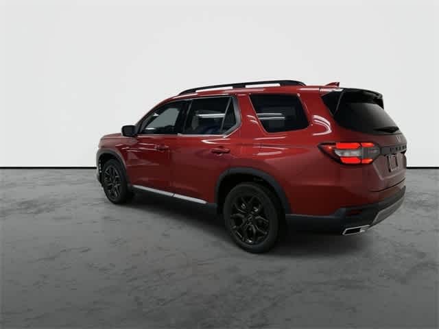 2025 Honda Pilot Touring+ Radiant Red Metallic II at Honda of Clear Lake