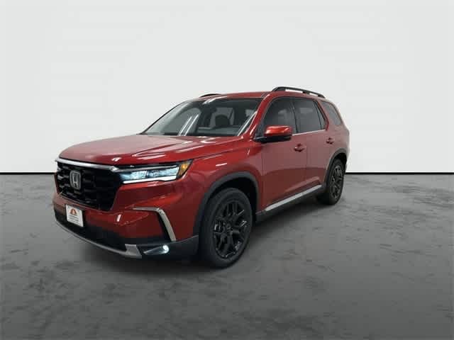 2025 Honda Pilot Touring+ Radiant Red Metallic II at Honda of Clear Lake