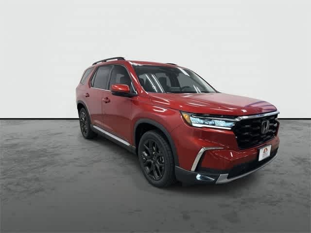 2025 Honda Pilot Touring+ Radiant Red Metallic II at Honda of Clear Lake