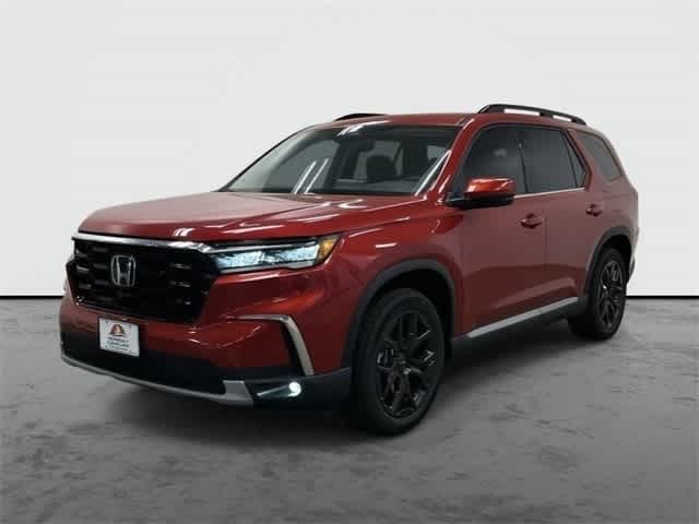 2025 Honda Pilot Touring+ Radiant Red Metallic II at Honda of Clear Lake