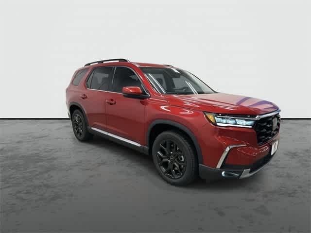 2025 Honda Pilot Touring+ Radiant Red Metallic II at Honda of Clear Lake