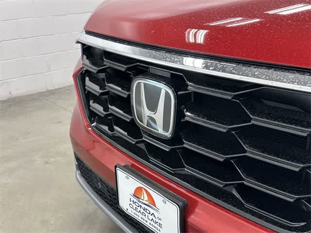 2025 Honda Pilot Touring+ Radiant Red Metallic II at Honda of Clear Lake
