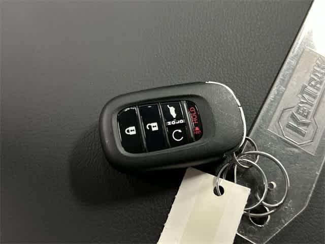 2025 Honda Pilot Touring+ Radiant Red Metallic II at Honda of Clear Lake