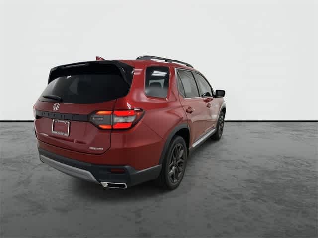 2025 Honda Pilot Touring+ Radiant Red Metallic II at Honda of Clear Lake