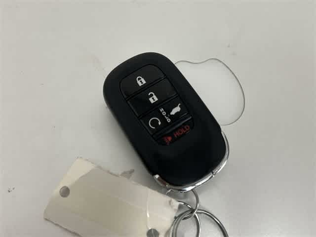 2025 Honda Pilot Touring+ Radiant Red Metallic II at Honda of Clear Lake