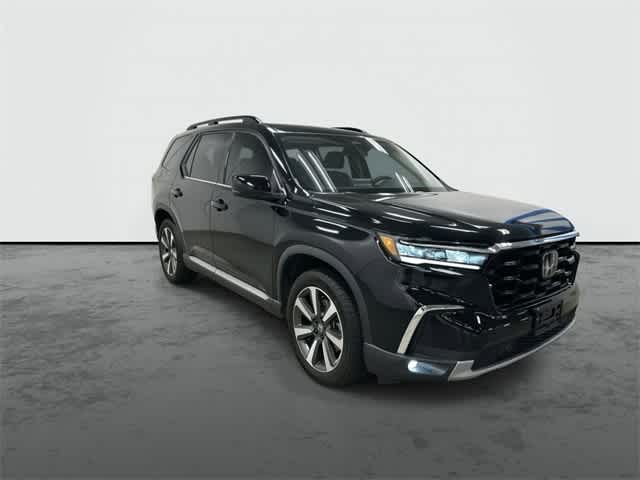 2023 Honda Pilot Touring Crystal Black Pearl at Sterling McCall Acura