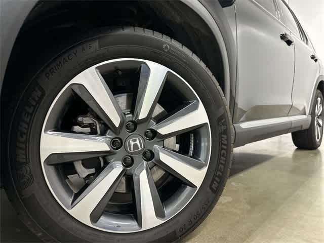 2023 Honda Pilot Touring Crystal Black Pearl at Sterling McCall Acura