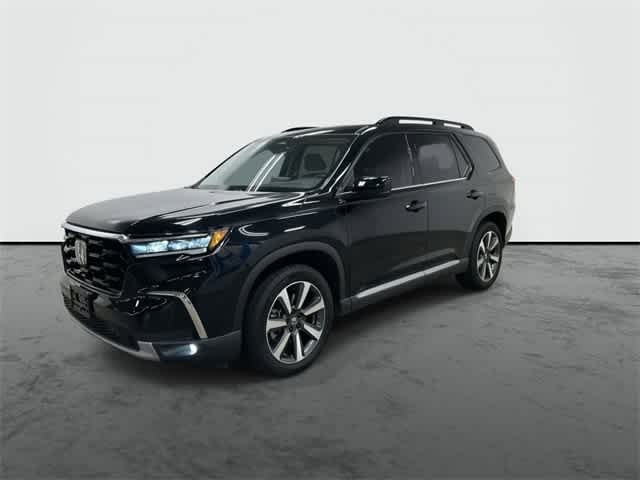 2023 Honda Pilot Touring Crystal Black Pearl at Sterling McCall Acura