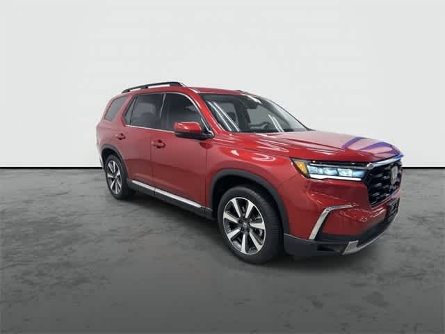 2025 Honda Pilot Touring Radiant Red Metallic II at Honda of Clear Lake