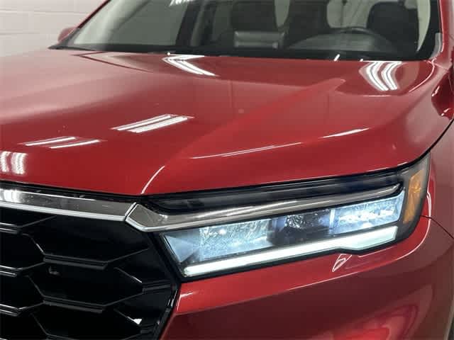 2025 Honda Pilot Touring Radiant Red Metallic II at Honda of Clear Lake