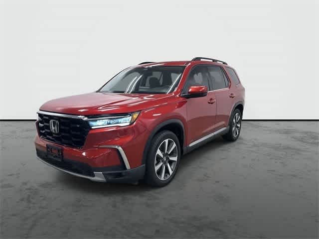 2025 Honda Pilot Touring Radiant Red Metallic II at Honda of Clear Lake