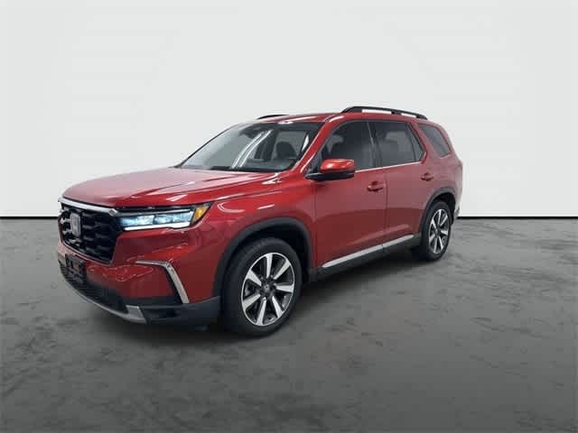 2025 Honda Pilot Touring Radiant Red Metallic II at Honda of Clear Lake
