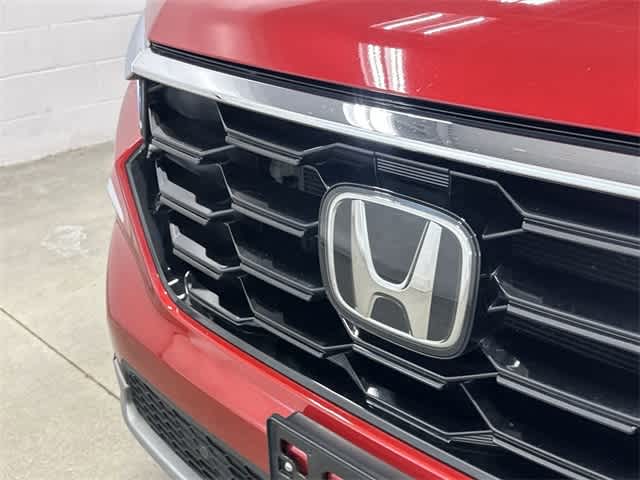 2025 Honda Pilot Touring Radiant Red Metallic II at Honda of Clear Lake