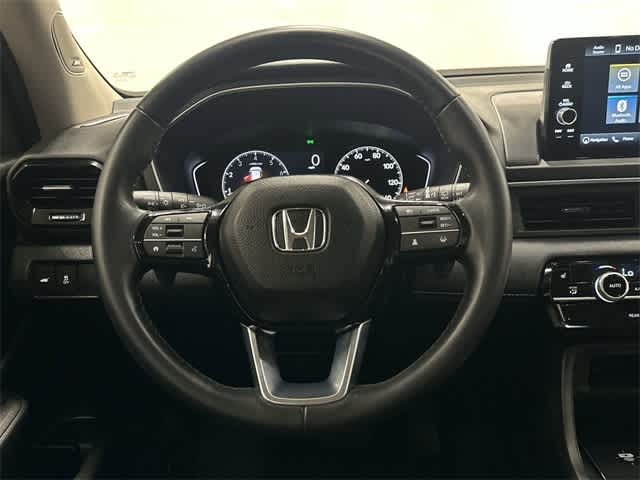 2025 Honda Pilot Touring Radiant Red Metallic II at Honda of Clear Lake