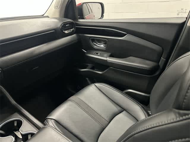 2025 Honda Pilot Touring Radiant Red Metallic II at Honda of Clear Lake