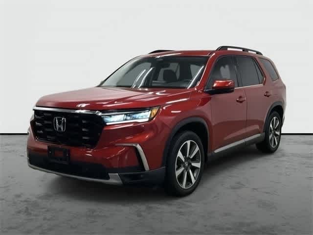 2025 Honda Pilot Touring Radiant Red Metallic II at Honda of Clear Lake