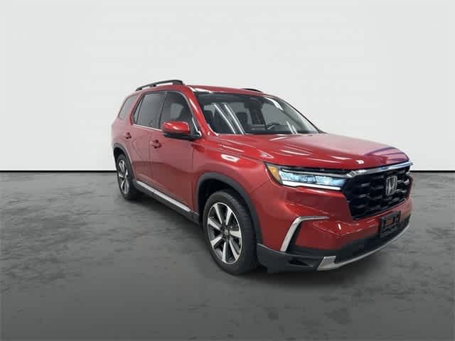 2025 Honda Pilot Touring Radiant Red Metallic II at Honda of Clear Lake