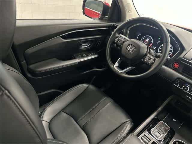 2025 Honda Pilot Touring Radiant Red Metallic II at Honda of Clear Lake