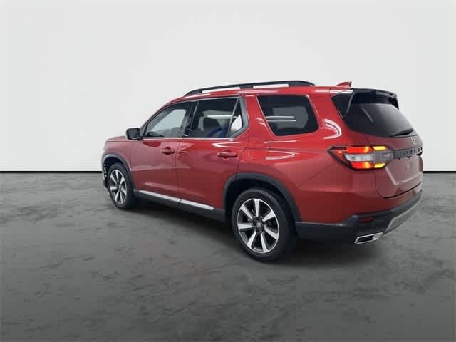 2025 Honda Pilot Touring Radiant Red Metallic II at Honda of Clear Lake