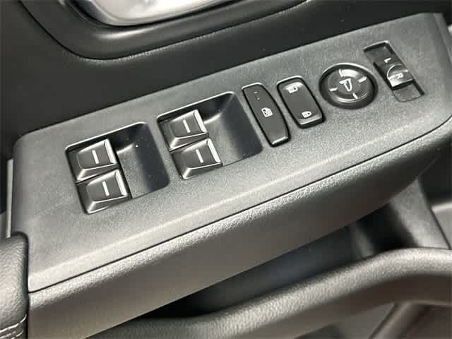 2025 Honda Pilot Touring Radiant Red Metallic II at Honda of Clear Lake