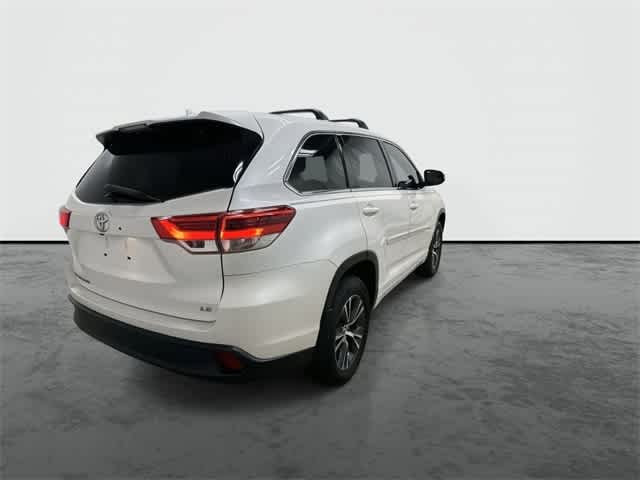 2018 Toyota Highlander LE Plus Blizzard Pearl at AutoNation Ford Gulf Fwy