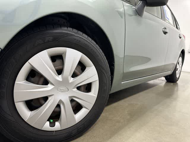 2016 Subaru Impreza 2.0i Jasmine Green Metallic at Mac Haik Ford