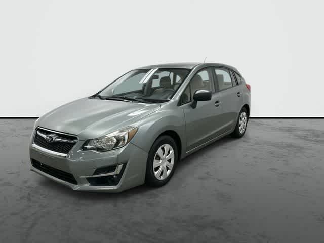 2016 Subaru Impreza 2.0i Jasmine Green Metallic at Mac Haik Ford