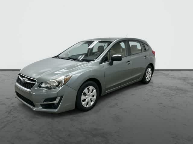 2016 Subaru Impreza 2.0i Jasmine Green Metallic at Mac Haik Ford