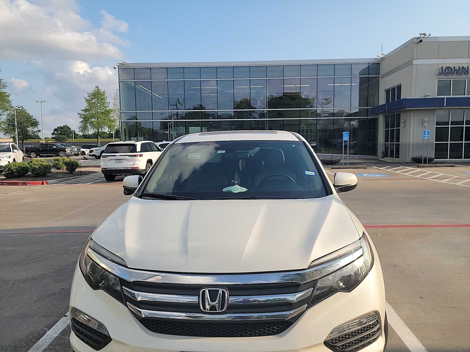 Used 2017 Honda Pilot EX-L with VIN 5FNYF5H50HB035407 for sale in Houston, TX
