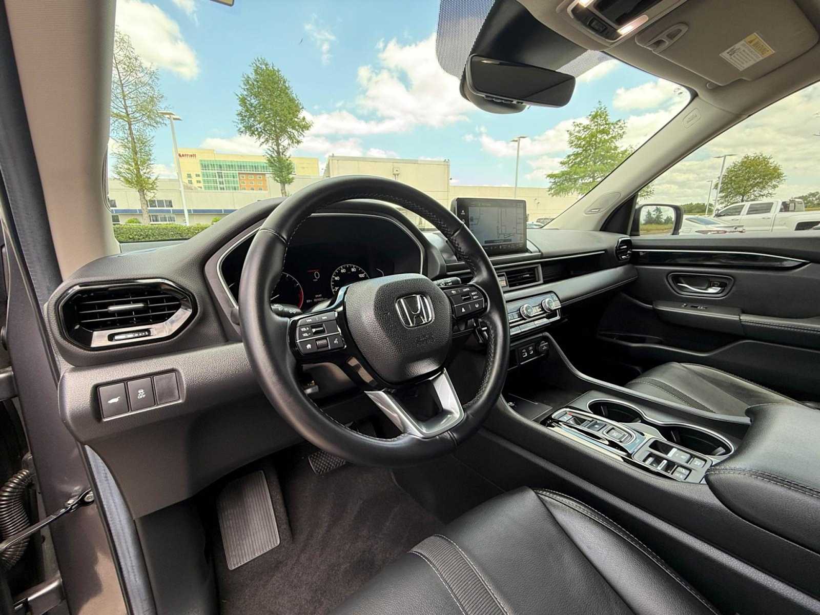 Used 2024 Honda Pilot Touring with VIN 5FNYG2H74RB006331 for sale in Houston, TX