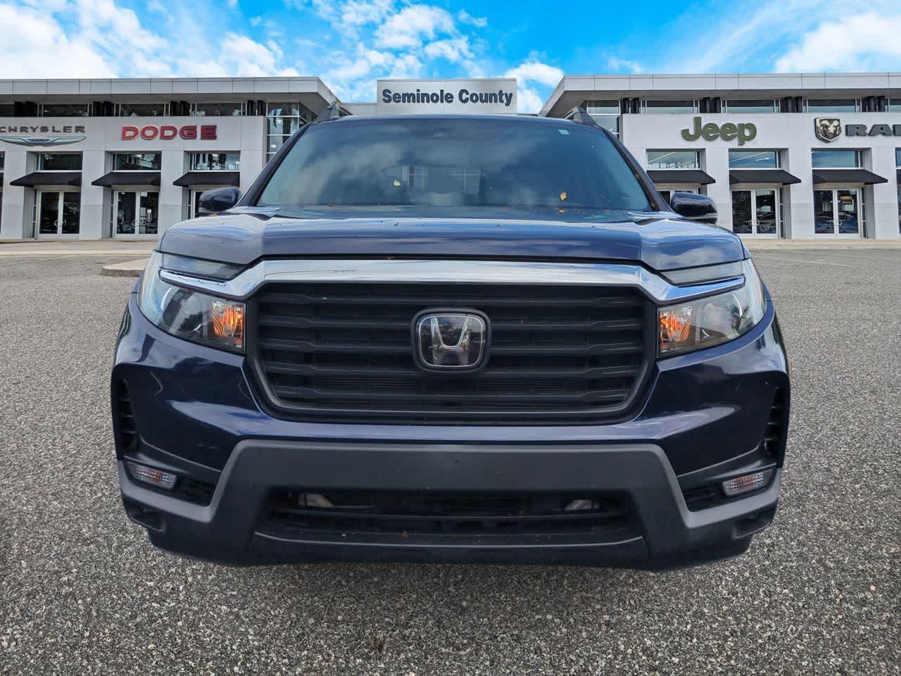 View vehicle photo 3