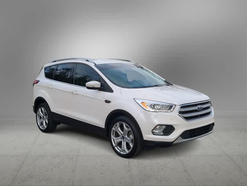 Used 2017 Ford Escape Titanium with VIN 1FMCU0J98HUE65091 for sale in New Port Richey, FL